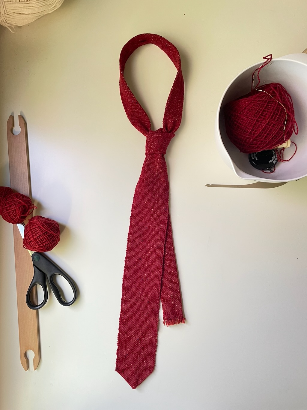 Lucky necktie lain down in a classic knot